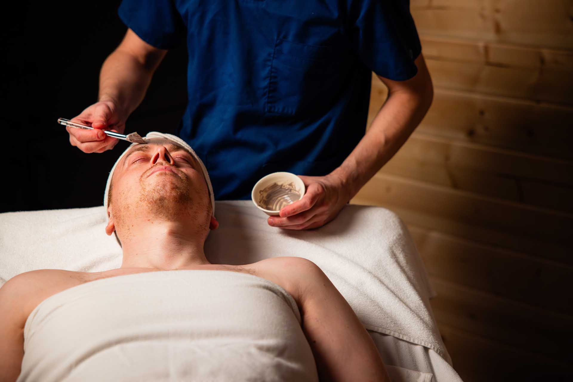 cream being applied to a person's face