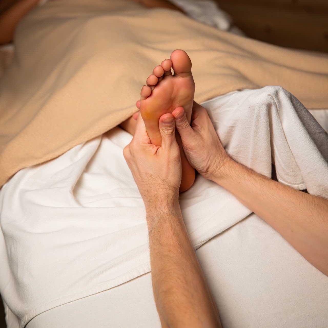 person having foot massage